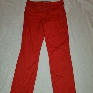 Size 9 mid rise skinny jeans (Red) good condition